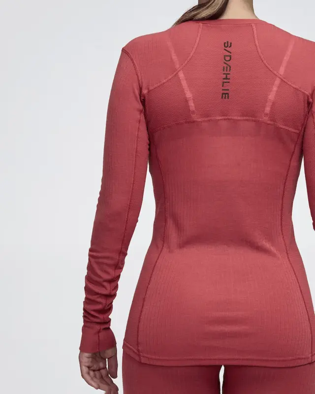 Dæhlie Dame Trøye performance-Tech M Teknisk undertøy med noe Ull Dusty Red 